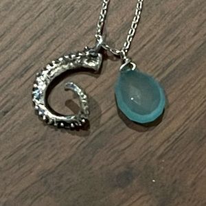 Cute silver tentacle and blue.faceted teardrop on silver chain with gift pouch